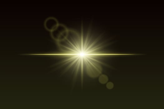 A bright star with a lens flare on a black background vector