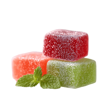 Delicious sugared fruit jellies stacked with fresh mint leaves png