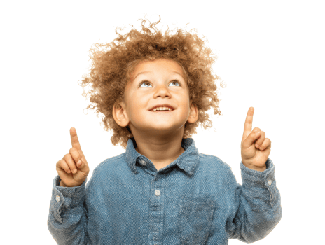 Happy child pointing upwards with curly hair and denim shirt png
