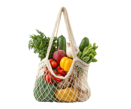 Eco-friendly bag filled with fresh vegetables and herbs png