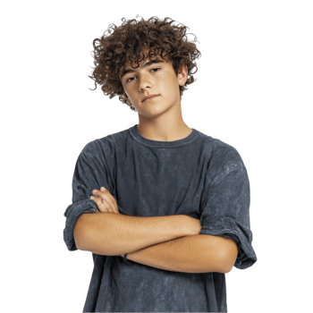 Teen boy in blue t-shirt standing with folded arms and relaxed expression isolated on transparent background png