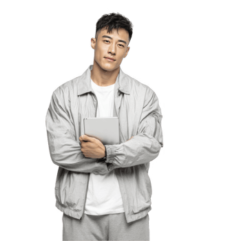 boy in grey tracksuit with relaxed smile and folded arms isolated on transparent background png