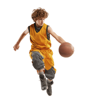 Little boy wearing orange jersey jumping while dribbling basketball isolated on transparent background png