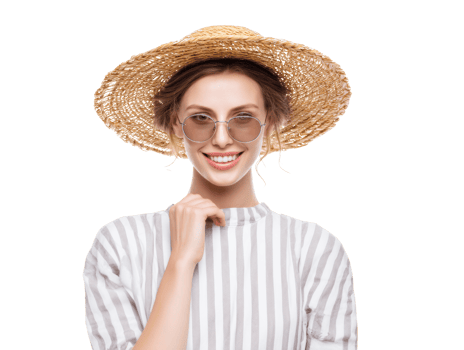 Smiling woman wearing sun hat and sunglasses in casual attire png