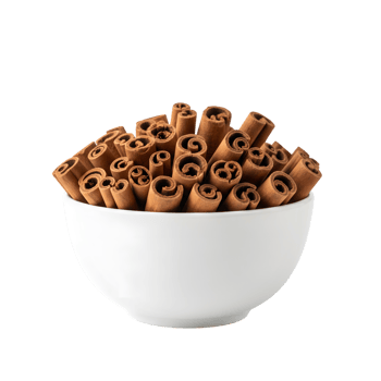 A full white ceramic bowl overflowing with tightly rolled cinnamon sticks showcasing their warm brown texture and natural spiral shapes isolated on transparent background png