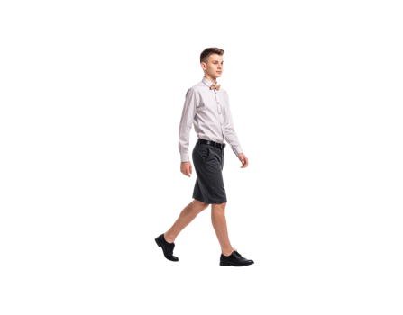 Young Man Walking in White Shirt and Shorts with Bowtie. png
