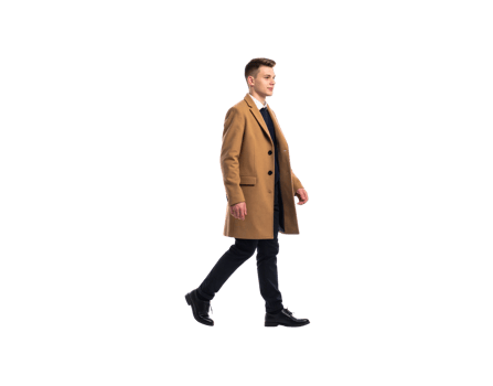 Young Man Walking in a Stylish Camel Coat and Black Jeans. png