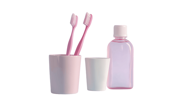 Cleaning supplies for oral hygiene with toothbrushes mouthwash and cup pink and white color personal care items bathroom essentials hygiene products health and wellness dental care hygiene routine png
