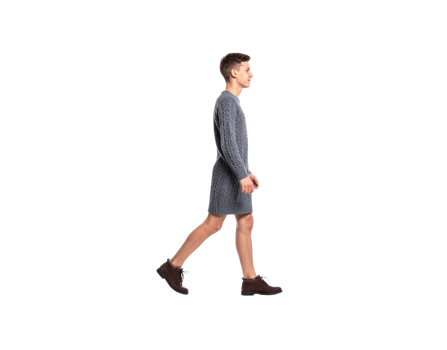Young man walking in gray knitted dress and brown leather boots. png