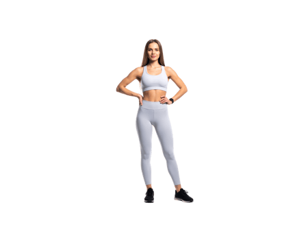 Fit Woman in White Activewear with Hands on Hips Confident Pose. png