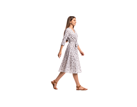 Woman in Floral Dress Walking with Brown Sandals Smiling Profile View. png