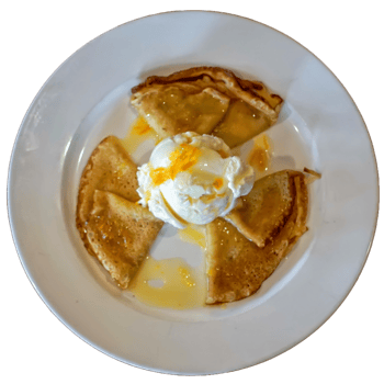 Crepes suzette or crepes with orange sauce and vanilla ice cream png