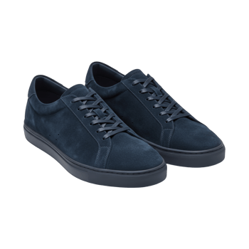 Pair of navy blue suede low top sneakers isolated on transparent background png
