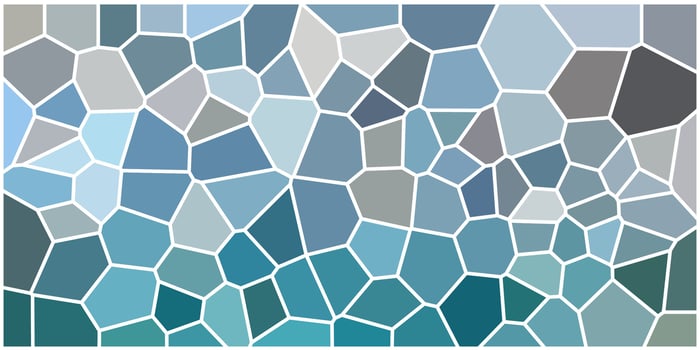 Blue-toned mosaic pattern with irregular geometric shapes, resembling stained glass with white borders and a cool, calming color palette. vector