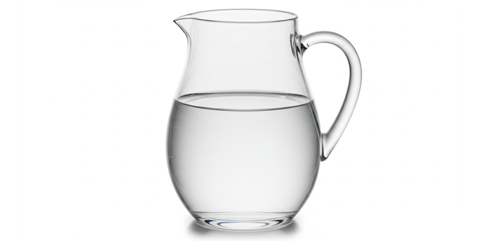 A clear glass pitcher with a handle on a white background png