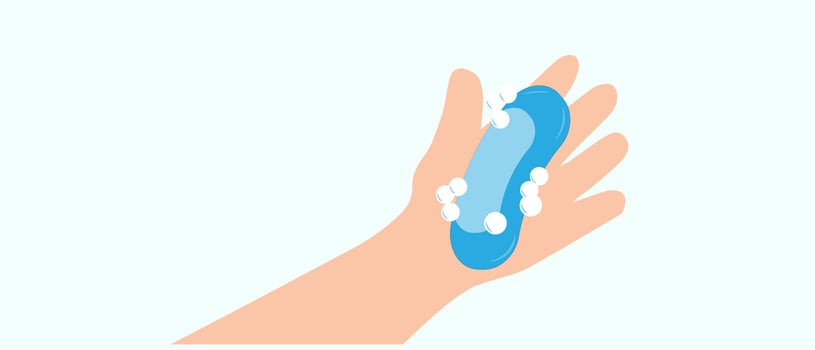 hand and soap bubbles on a light background vector