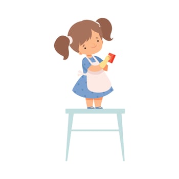 Cute Little Girl in Apron Standing on Chair with Rag Helping to Clean House Cartoon Style Illustration vector