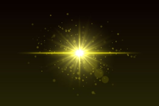 A bright yellow light shining on a black background vector