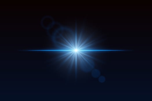 A blue light shining on a dark background vector