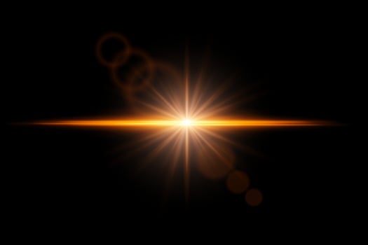 A bright starburst on a black background vector