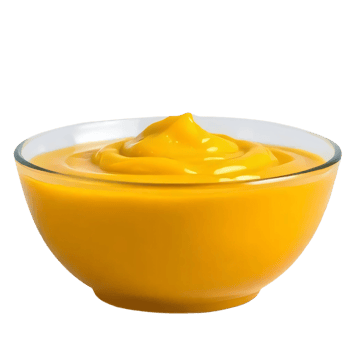 A bowl of orange sauce on a black background png