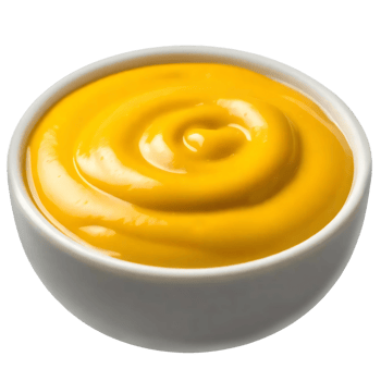 A bowl of yellow sauce on a black background png