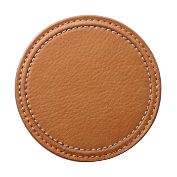 High resolution close-up image of a round tan leather coaster with decorative stitching png
