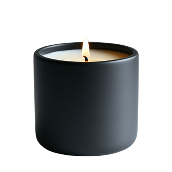 A dark gray candle in a cylindrical container burns brightly against a black background a single flame illuminating the wax png