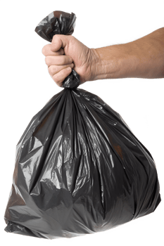 Hand holding black garbage bag isolated, waste disposal concept with crinkled plastic texture png