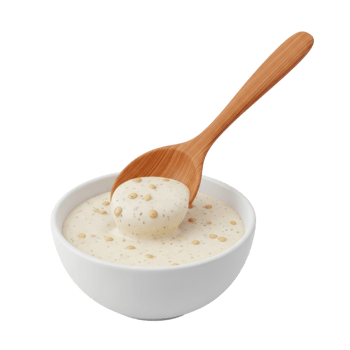 Bowl of Creamy White Sauce with Wooden Spoon png