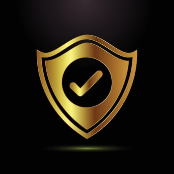 Golden shield with check mark vector