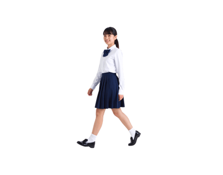 Cheerful Asian schoolgirl in a traditional uniform walking and smiling over her shoulder. png