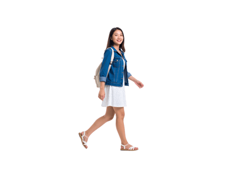 Smiling young Asian woman in a denim jacket and sundress walking with a white backpack. png