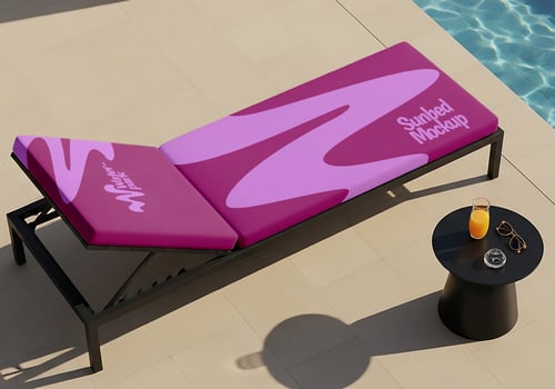 A purple sunbed by the pool ready for relaxation psd