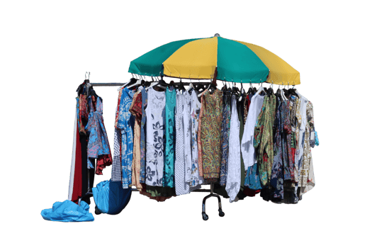 Clothes rack displaying colorful summer fashion at an outdoor market with transparent background png