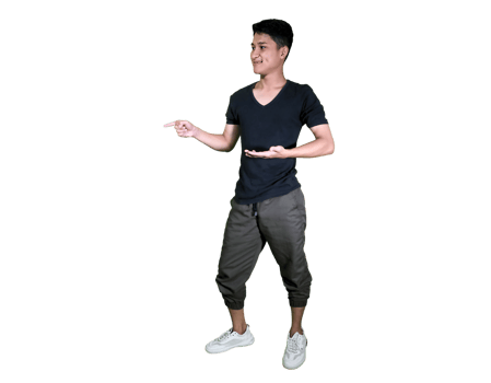 A confident young man in a grey patterned sweater and pants stands pointing to the side. png