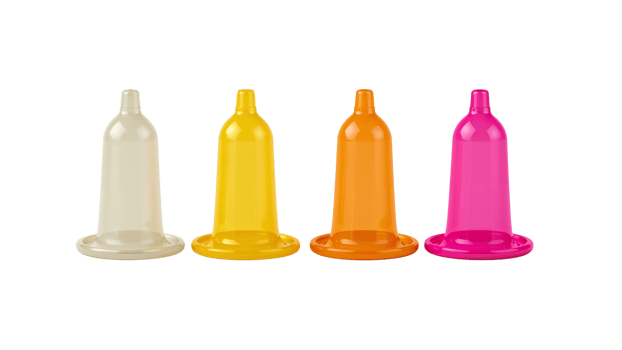 Colorful collection of prophylactics arranged horizontally in a row on a transparent display, png
