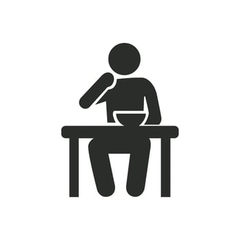 A black silhouette icon of a person eating from a bowl at a table, representing having breakfast. vector