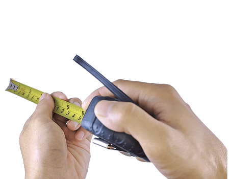 Hand Holding a Tape Measure Against White Background png