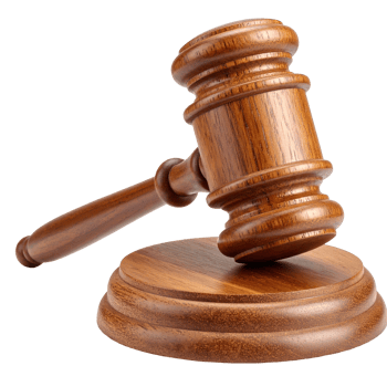 Wooden gavel resting on a circular stand isolated on a transparent background. png