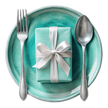 A green plate with a gift wrapped in a bow png