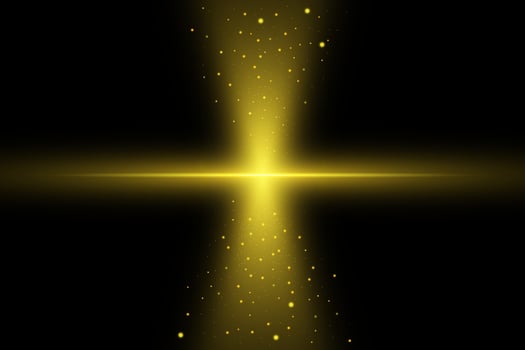 Golden burst of light on black background vector