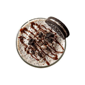 Delicious creamy milkshake topped with chocolate syrup cookie crumbs and a cookie png