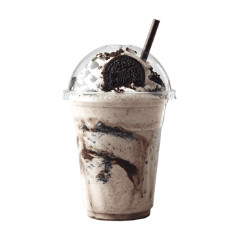 Creamy milkshake with chocolate cookie topping and whipped cream in a plastic cup with a straw png