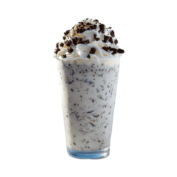 Creamy milkshake with whipped cream and chocolate cookie pieces in a glass png