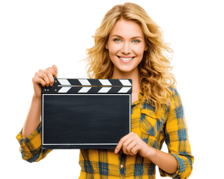 Young woman smiling holding film slate cheerful expression casual yellow plaid shirt isolated background movie production filmmaking creative industry happy mood blonde hair png