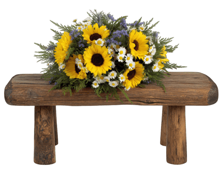 Vibrant floral arrangement featuring sunflowers and daisies is beautifully displayed on rustic wooden bench. bright colors and natural elements evoke cheerful and inviting atmosphere png