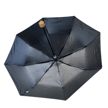 Elevated view of black umbrella designed for rain protection, featuring a curved handle and light-reflective fabric for visibility and safety png