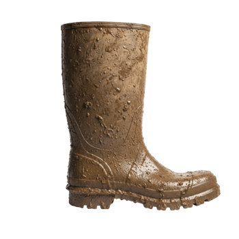 A single brown rubber boot is heavily covered in mud and water droplets, suggesting outdoor activity or wet conditions. Ideal for themes of farming, gardening, or messy adventures. png