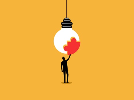 businessman completes a lightbulb puzzle vector